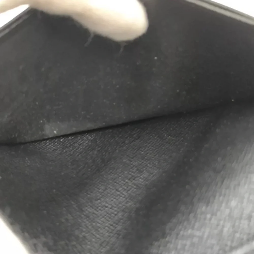 Louis Vuttton Damier Graphite wallet.